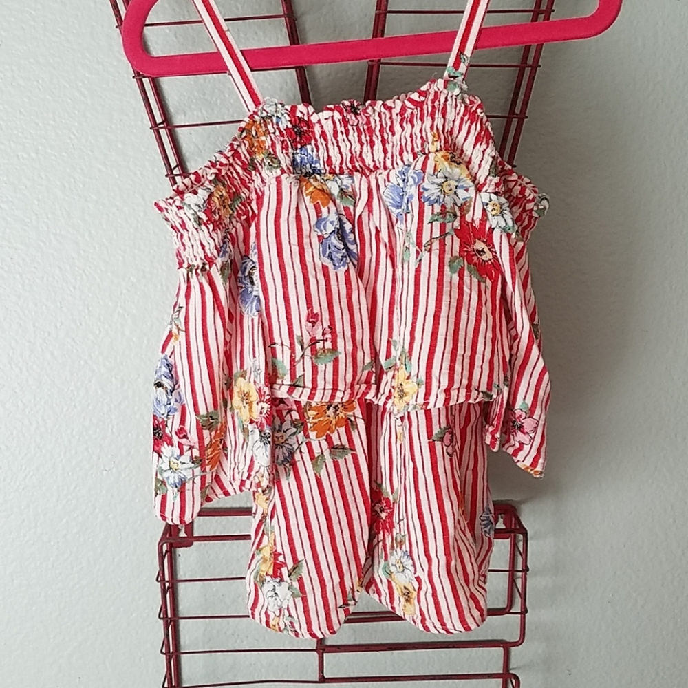 Cute red and white with red,blue,and yellow flower